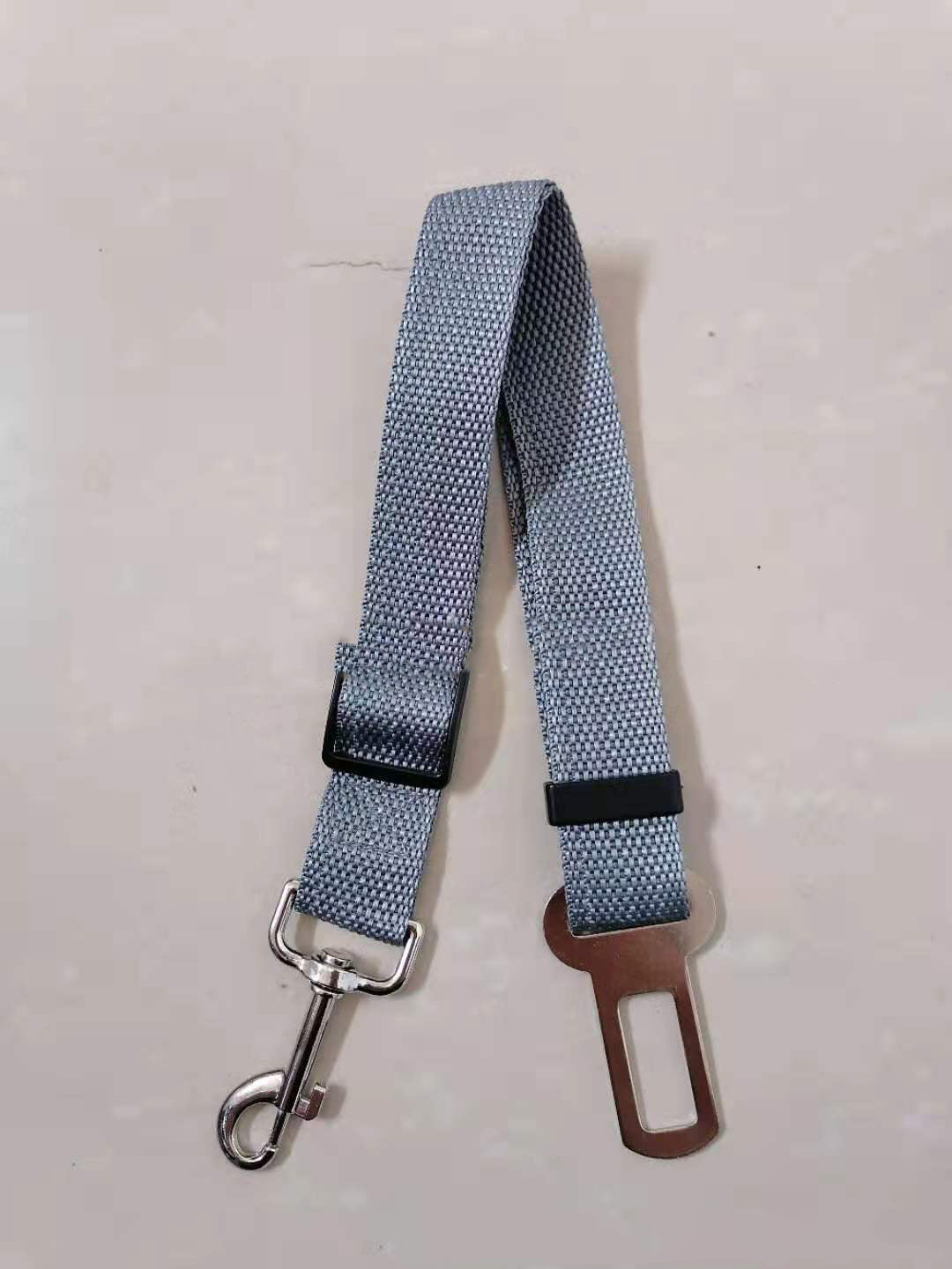 Retractable adjustable seat belt traction belt